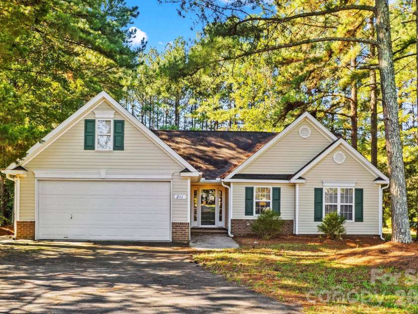 211 Whispering Pines Lane, Linwood, NC 27299.  MLS# CAR4429174, YatesRealty ID 54867. 