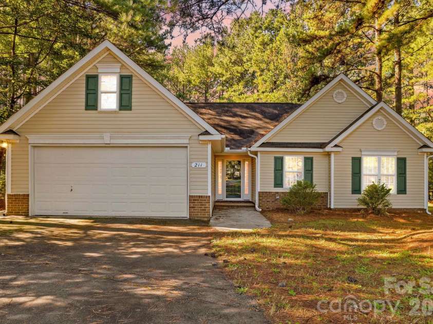211 Whispering Pines Lane, Linwood, NC 27299.  MLS# CAR4429174, YatesRealty ID 54867. 