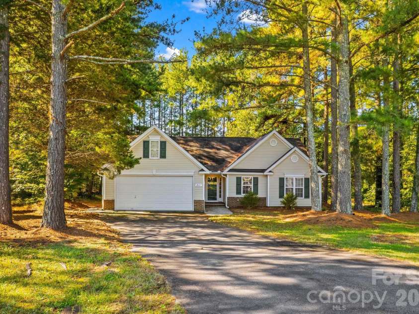 211 Whispering Pines Lane, Linwood, NC 27299.  MLS# CAR4429174, YatesRealty ID 54867. 