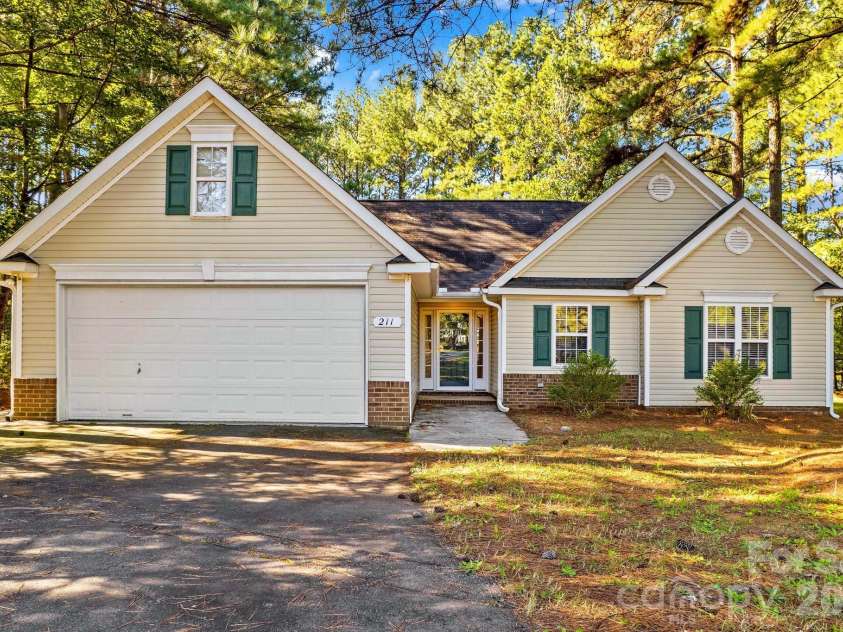 211 Whispering Pines Lane, Linwood, NC 27299.  MLS# CAR4429174, YatesRealty ID 54867. 