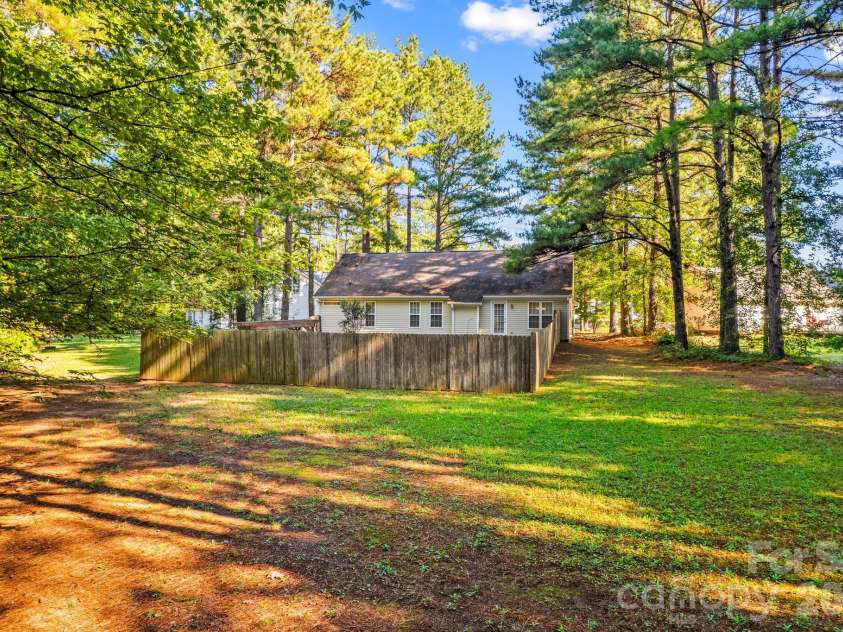 211 Whispering Pines Lane, Linwood, NC 27299.  MLS# CAR4429174, YatesRealty ID 54867. 