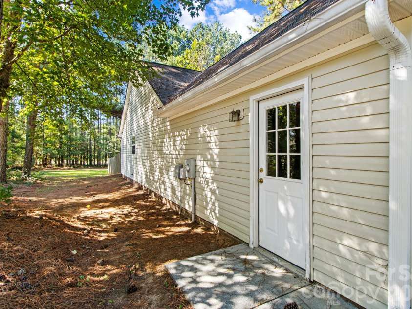211 Whispering Pines Lane, Linwood, NC 27299.  MLS# CAR4429174, YatesRealty ID 54867. 
