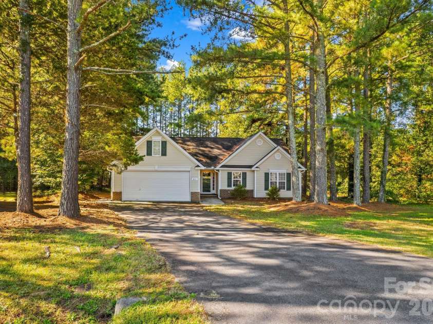 211 Whispering Pines Lane, Linwood, NC 27299.  MLS# CAR4429174, YatesRealty ID 54867. 