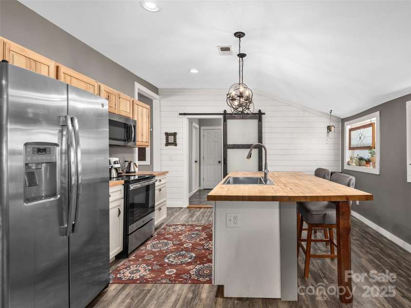 259 Herron Cove Road, Weaverville, NC 28787.  MLS# CAR4228536, YatesRealty ID 5487. Tons of natural light!