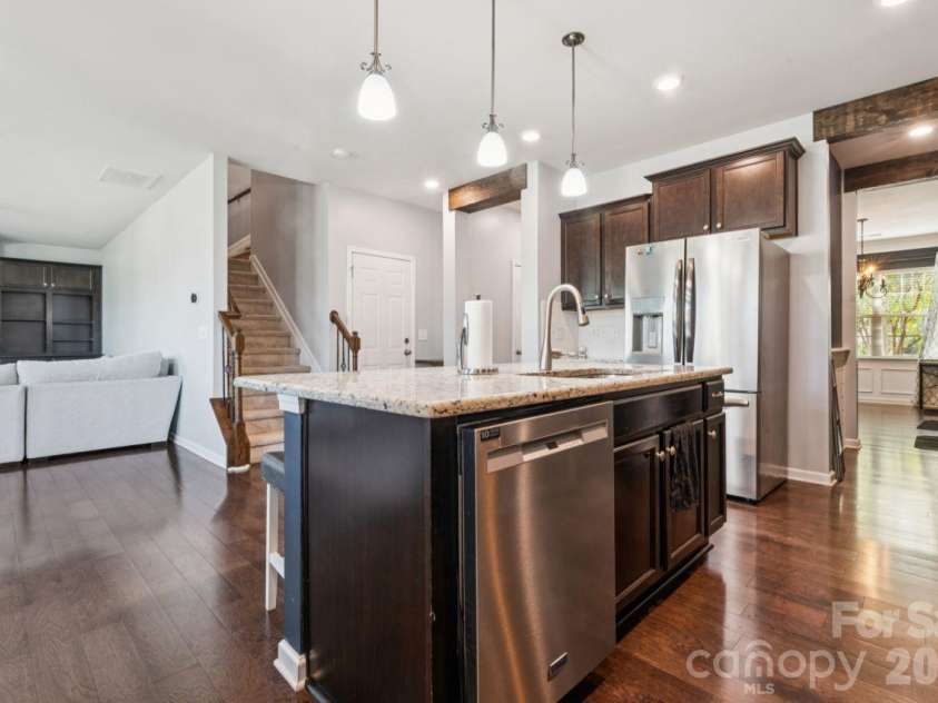 3018 Oakmere Road, Waxhaw, NC 28173.  MLS# CAR4431624, YatesRealty ID 54879. Kitchen into Living Room