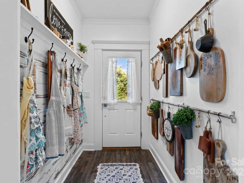 704 Main Avenue, Newton, NC 28658.  MLS# CAR4275934, YatesRealty ID 5489. Access to back yard and back deck