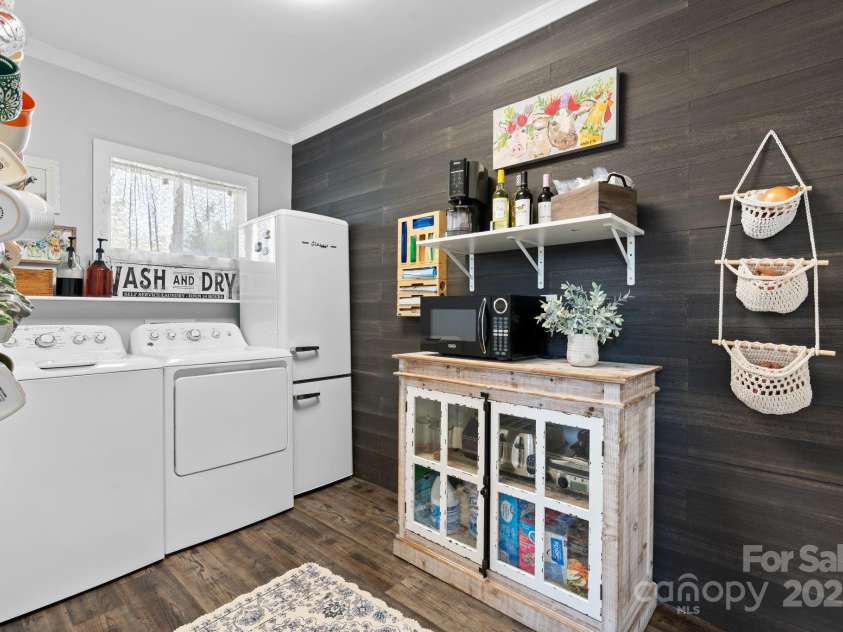 704 Main Avenue, Newton, NC 28658.  MLS# CAR4275934, YatesRealty ID 5489. Laundry room off kitchen with washer / dryer/ extra fridge (all are negotiable).