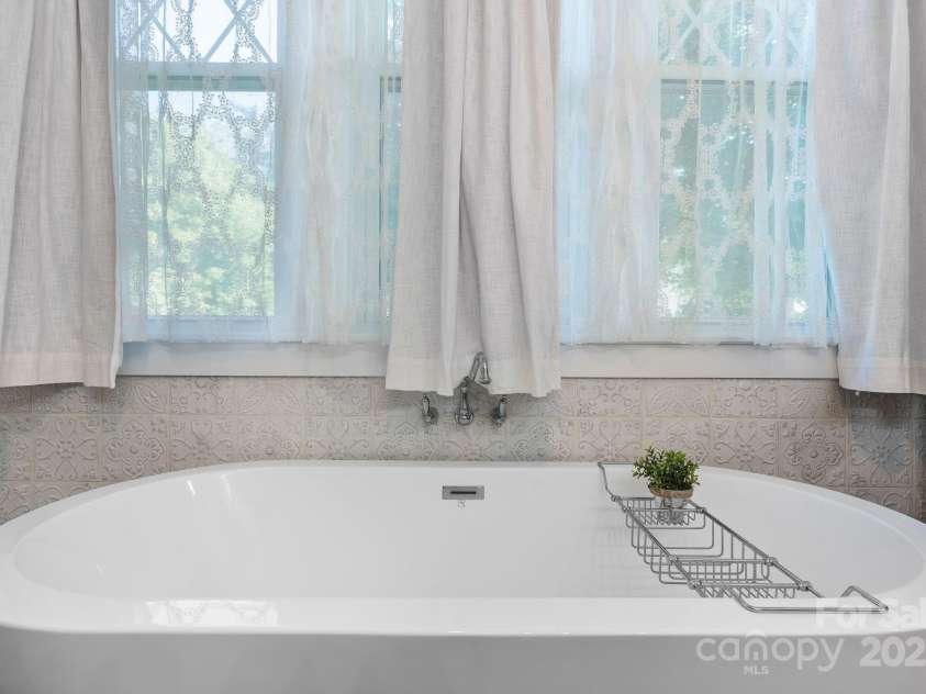 704 Main Avenue, Newton, NC 28658.  MLS# CAR4275934, YatesRealty ID 5489. Master Walk in shower