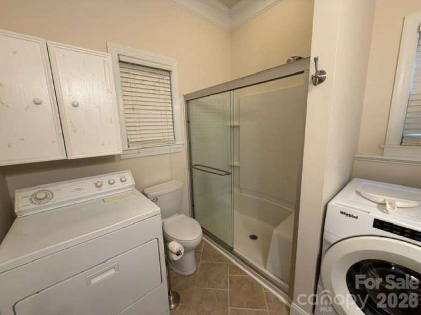 109 Driftwood Trail, Mount Gilead, NC 27306.  MLS# CAR4431756, YatesRealty ID 54915. Master Bath Shower & Dryer