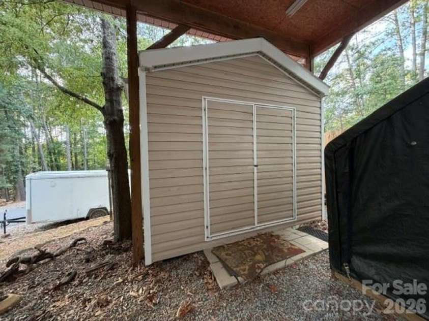 109 Driftwood Trail, Mount Gilead, NC 27306.  MLS# CAR4431756, YatesRealty ID 54915. Storage Bldg