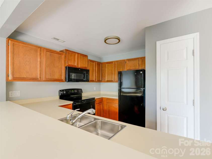 766 Marsh Road, Charlotte, NC 28209.  MLS# CAR4408658, YatesRealty ID 54919. Kitchen and pantry