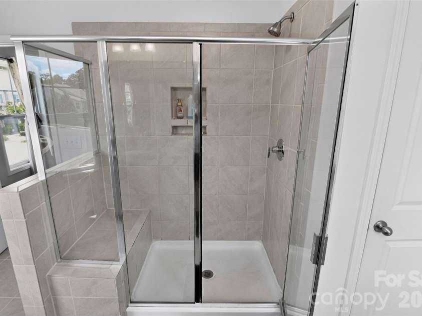 1019 Chicory Trace, Clover, SC 29710.  MLS# CAR4400233, YatesRealty ID 54923. Luxury oversized shower with bench