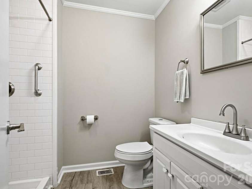 2118 Lampglow Court, Gastonia, NC 28056.  MLS# CAR4426612, YatesRealty ID 54938. Hallway Bathroom