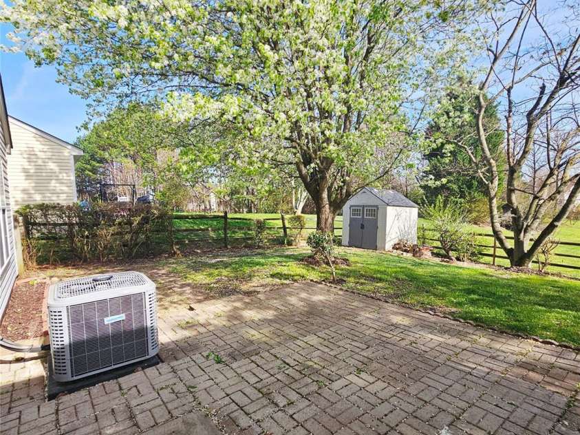 3308 Covelo Court, Charlotte, NC 28262.  MLS# CAR4355252, YatesRealty ID 5495. Back yard view