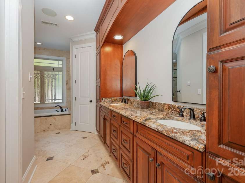 7029 Pebble Bay Drive, Denver, NC 28037.  MLS# CAR4192335, YatesRealty ID 5495. Primary bath, lots of storage.