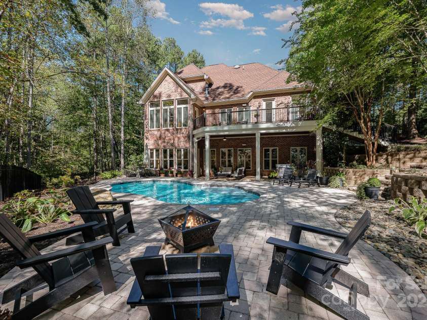 7029 Pebble Bay Drive, Denver, NC 28037.  MLS# CAR4192335, YatesRealty ID 5495. The perfect fire pit set up!
