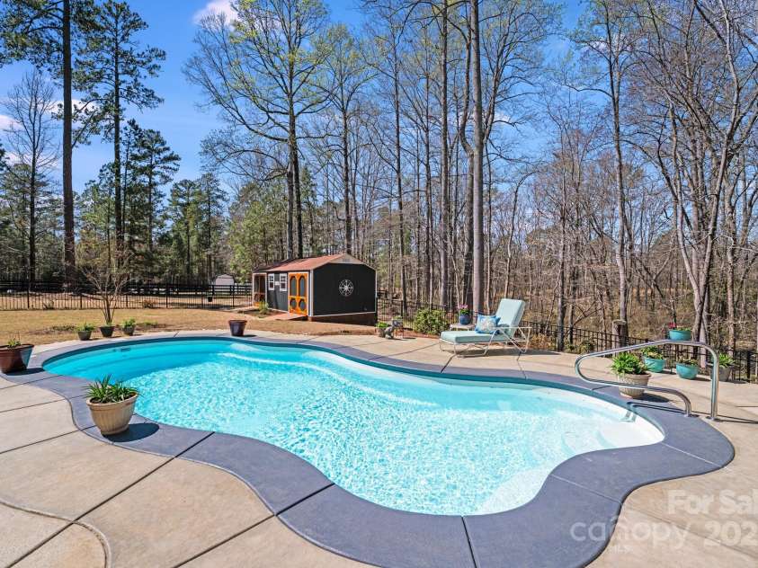 1016 Secretariat Drive, York, SC 29745.  MLS# CAR4244338, YatesRealty ID 5497. Beautiful saltwater pool