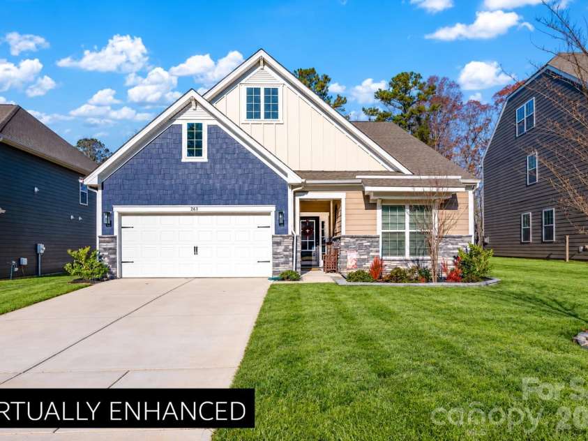 263 Hamptons Cove Road, Troutman, NC 28166.  MLS# CAR4431829, YatesRealty ID 54972. Virtual grass added to the front yard.