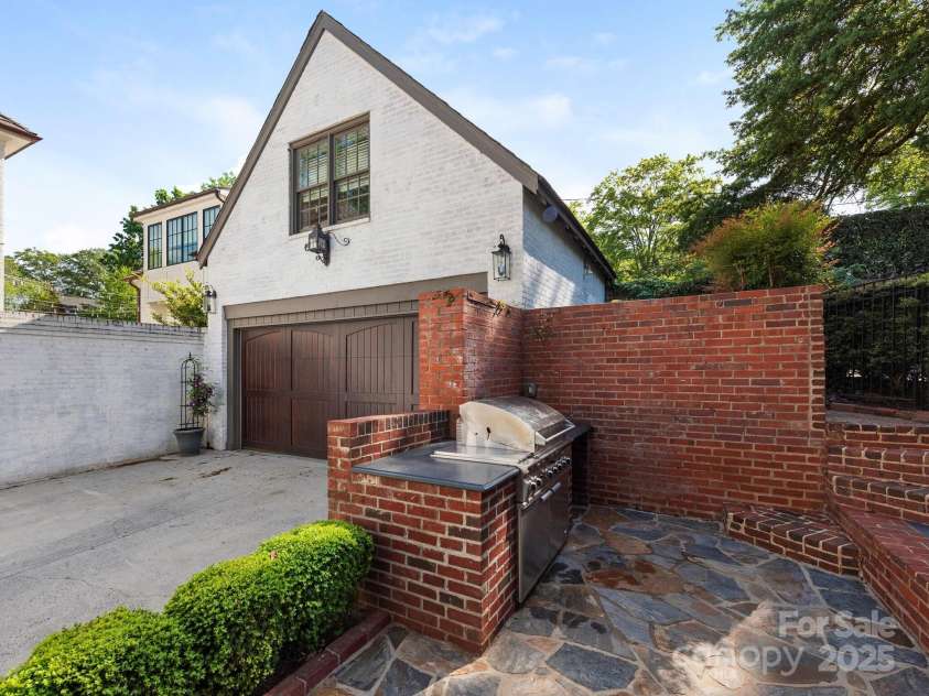 2030 Radcliffe Avenue, Charlotte, NC 28207.  MLS# CAR4244350, YatesRealty ID 5498. Grill Area & Guest Suite above Detached Garage
