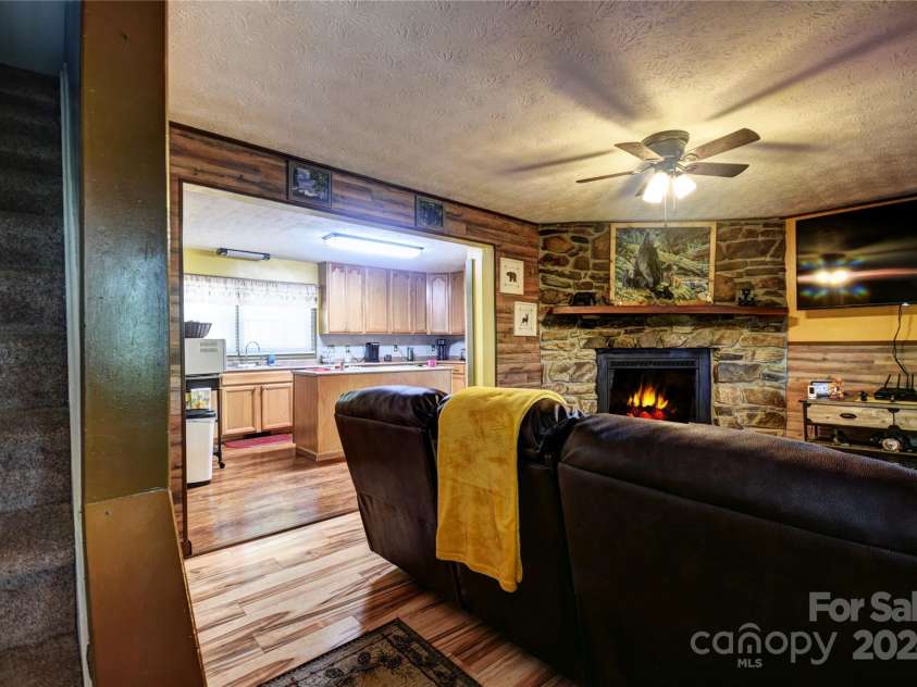 201 Acorn Lane, Clyde, NC 28721.  MLS# CAR4153632, YatesRealty ID 5499. From the front entry door off the porch