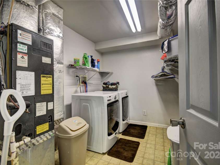 201 Acorn Lane, Clyde, NC 28721.  MLS# CAR4153632, YatesRealty ID 5499. Laundry Room and air handler for the main level and basement