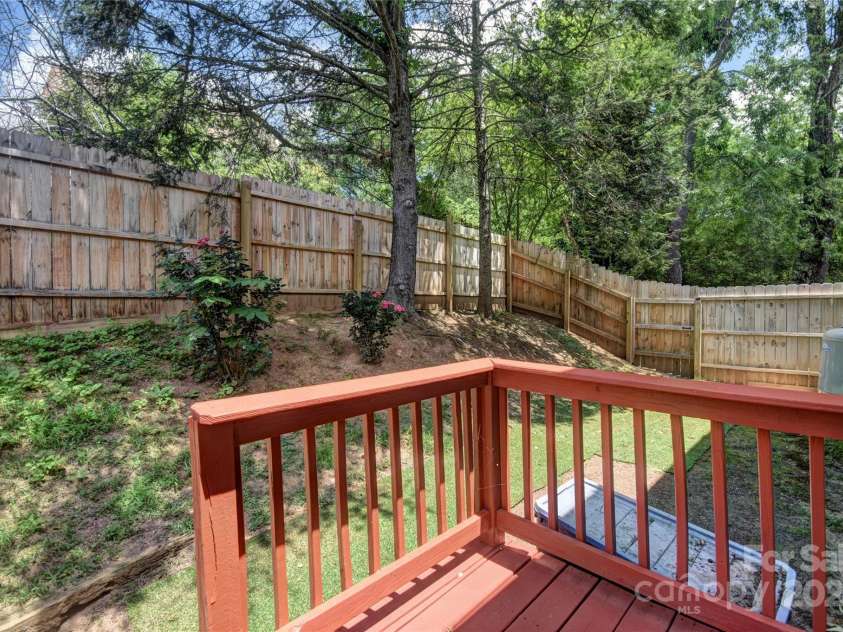 201 Acorn Lane, Clyde, NC 28721.  MLS# CAR4153632, YatesRealty ID 5499. Step out the back door to the privacy-fenced back yard