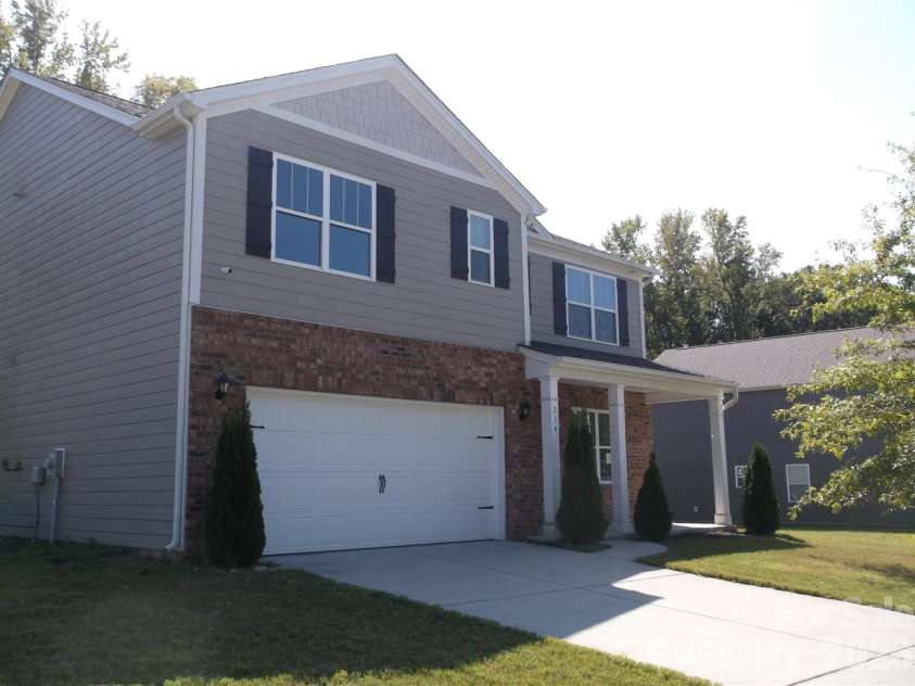 214 Wildflower Drive, Locust, NC 28097.  MLS# CAR4431888, YatesRealty ID 54990. 