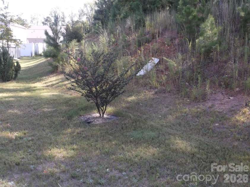 214 Wildflower Drive, Locust, NC 28097.  MLS# CAR4431888, YatesRealty ID 54990. 