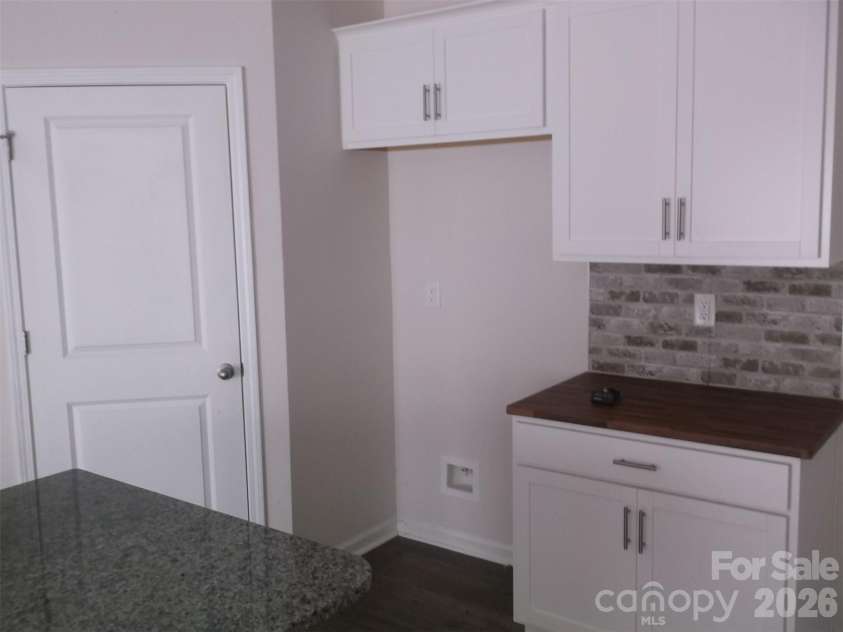 214 Wildflower Drive, Locust, NC 28097.  MLS# CAR4431888, YatesRealty ID 54990. 