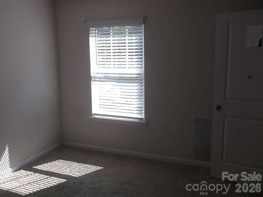 214 Wildflower Drive, Locust, NC 28097.  MLS# CAR4431888, YatesRealty ID 54990. 
