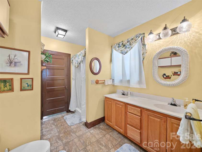 163 Cub Howell Road, Bakersville, NC 28705.  MLS# CAR4431872, YatesRealty ID 54999. 