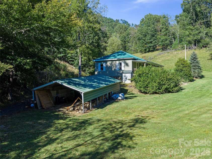 163 Cub Howell Road, Bakersville, NC 28705.  MLS# CAR4431872, YatesRealty ID 54999. 