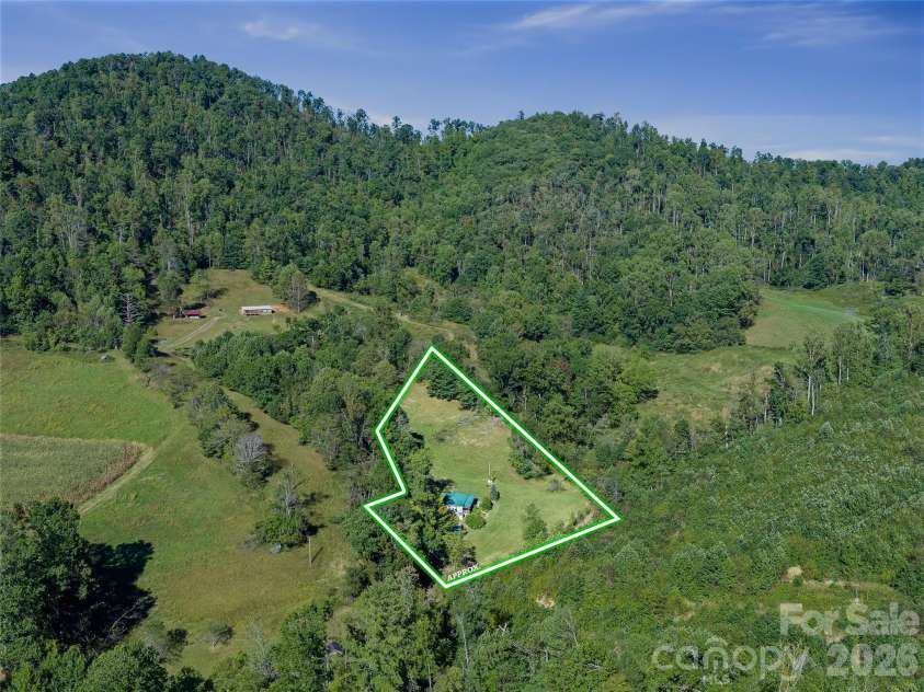 163 Cub Howell Road, Bakersville, NC 28705.  MLS# CAR4431872, YatesRealty ID 54999. 