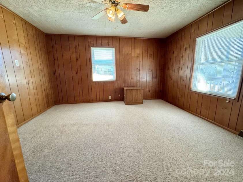 565 Neely Road, Brevard, NC 28712.  MLS# CAR4074647, YatesRealty ID 55. Main Home Bedroom #1