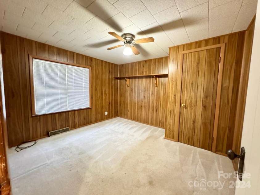 565 Neely Road, Brevard, NC 28712.  MLS# CAR4074647, YatesRealty ID 55. Main Home Bedroom #3