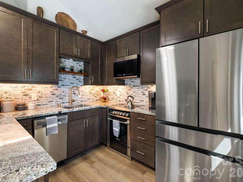 607 Kanuga Road, Hendersonville, NC 28739.  MLS# CAR4431677, YatesRealty ID 55003. 