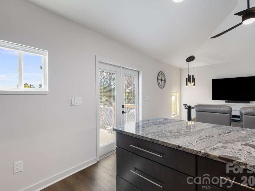 607 Kanuga Road, Hendersonville, NC 28739.  MLS# CAR4431677, YatesRealty ID 55003. 