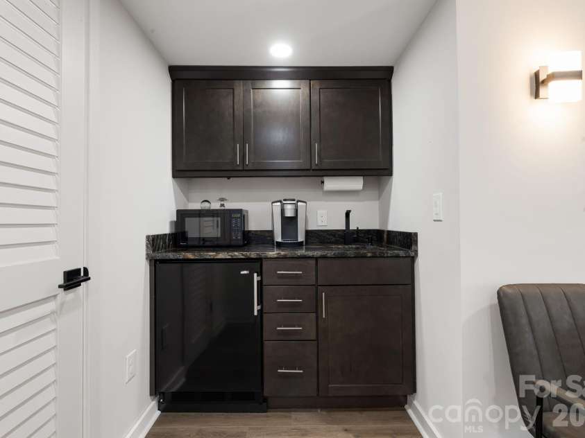 607 Kanuga Road, Hendersonville, NC 28739.  MLS# CAR4431677, YatesRealty ID 55003. 