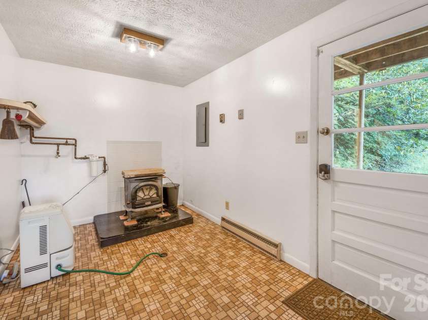 74 Lanzi Ledge Road, Leicester, NC 28748.  MLS# CAR4423050, YatesRealty ID 55008. Current Main Entrance (see note about moisture)