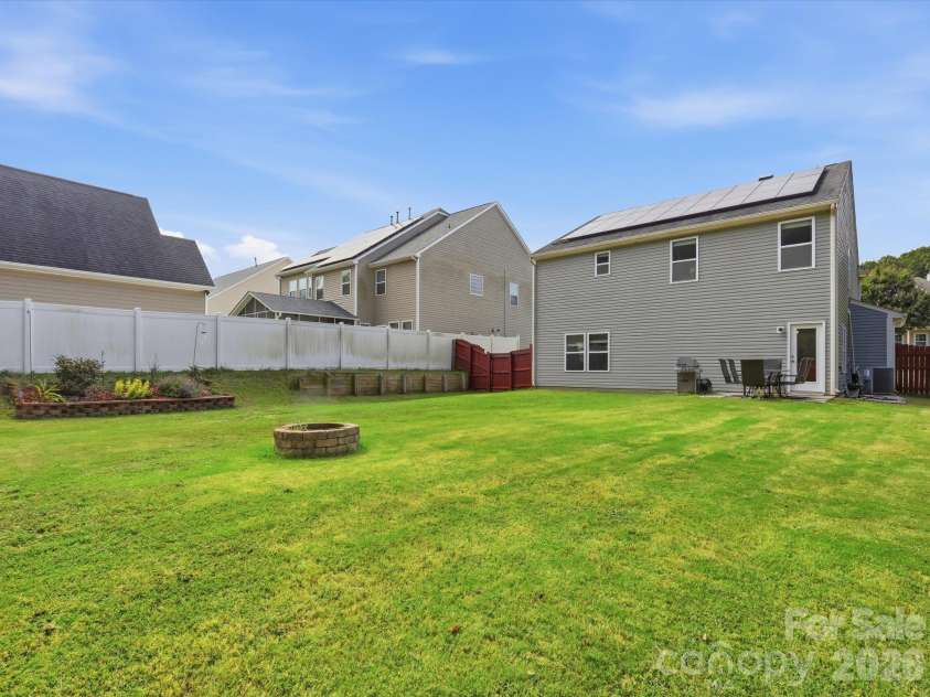 2104 Argentum Avenue, Indian Land, SC 29707.  MLS# CAR4429934, YatesRealty ID 55011. Large Backyard with Firepit