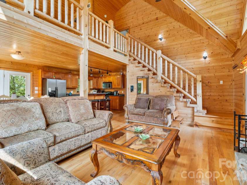 1003 Deerwood Road, Piney Creek, NC 28663.  MLS# CAR4431542, YatesRealty ID 55017. Great Room