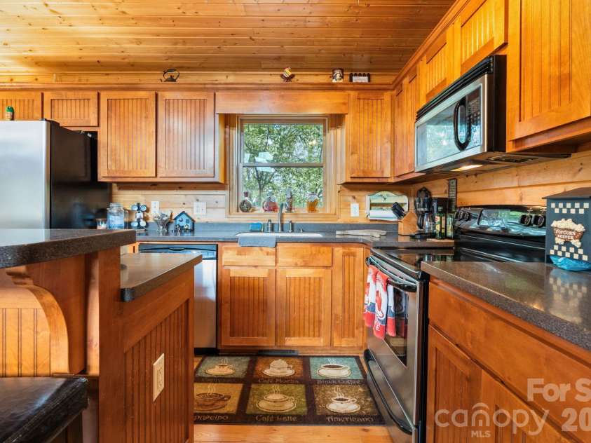 1003 Deerwood Road, Piney Creek, NC 28663.  MLS# CAR4431542, YatesRealty ID 55017. Kitchen