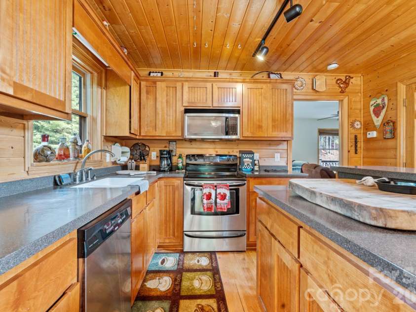 1003 Deerwood Road, Piney Creek, NC 28663.  MLS# CAR4431542, YatesRealty ID 55017. Kitchen Area