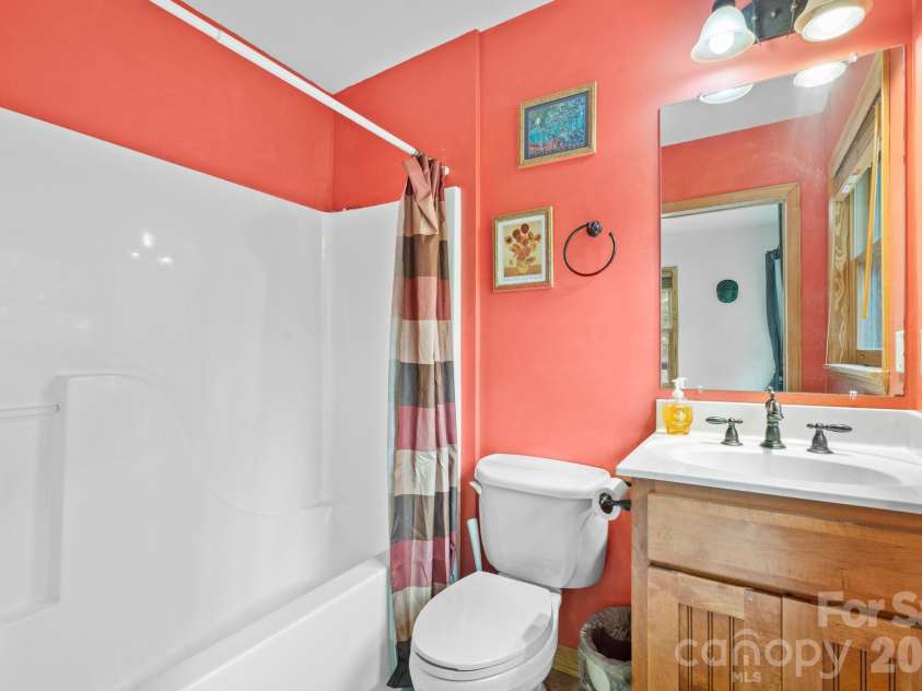 1003 Deerwood Road, Piney Creek, NC 28663.  MLS# CAR4431542, YatesRealty ID 55017. Main Level Den/Entertainment Full Bathroom