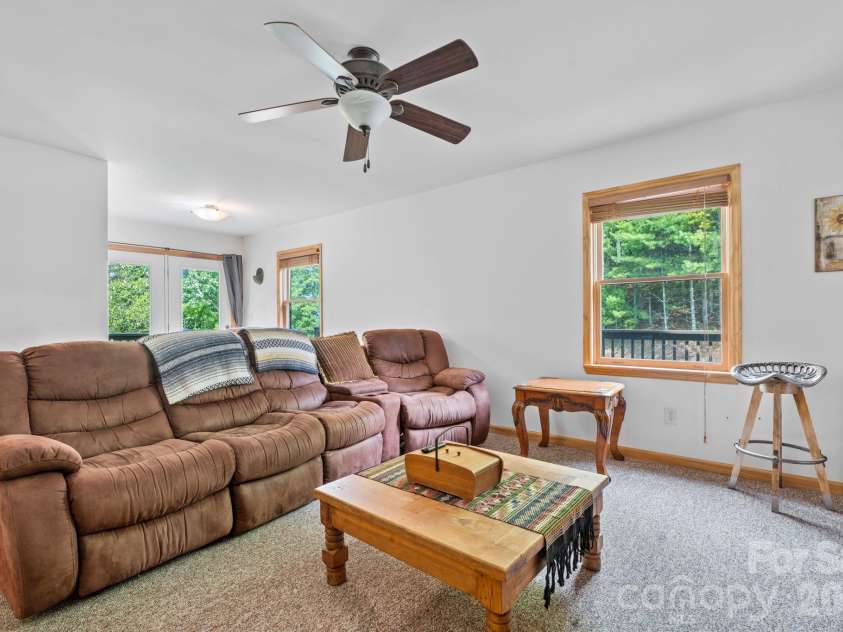 1003 Deerwood Road, Piney Creek, NC 28663.  MLS# CAR4431542, YatesRealty ID 55017. Main Level Den/Entertainment Room