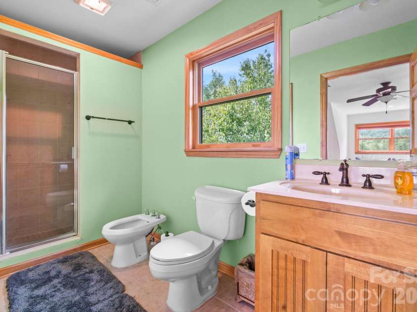 1003 Deerwood Road, Piney Creek, NC 28663.  MLS# CAR4431542, YatesRealty ID 55017. Master Bathroom with Bidet