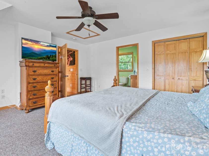 1003 Deerwood Road, Piney Creek, NC 28663.  MLS# CAR4431542, YatesRealty ID 55017. Master Bedroom