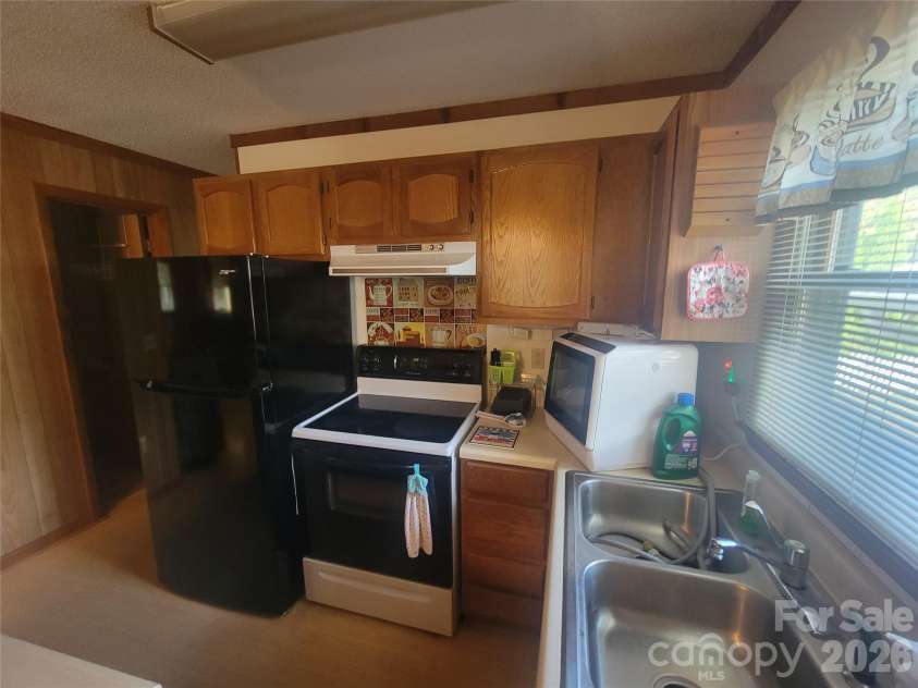 265 Midland Drive, Waynesville, NC 28785.  MLS# CAR4428113, YatesRealty ID 55044. 
