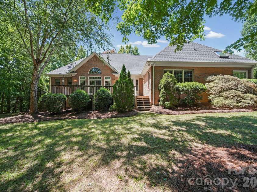 417 Crooked Oak Drive, Oakboro, NC 28129.  MLS# CAR4399226, YatesRealty ID 55048. Back view