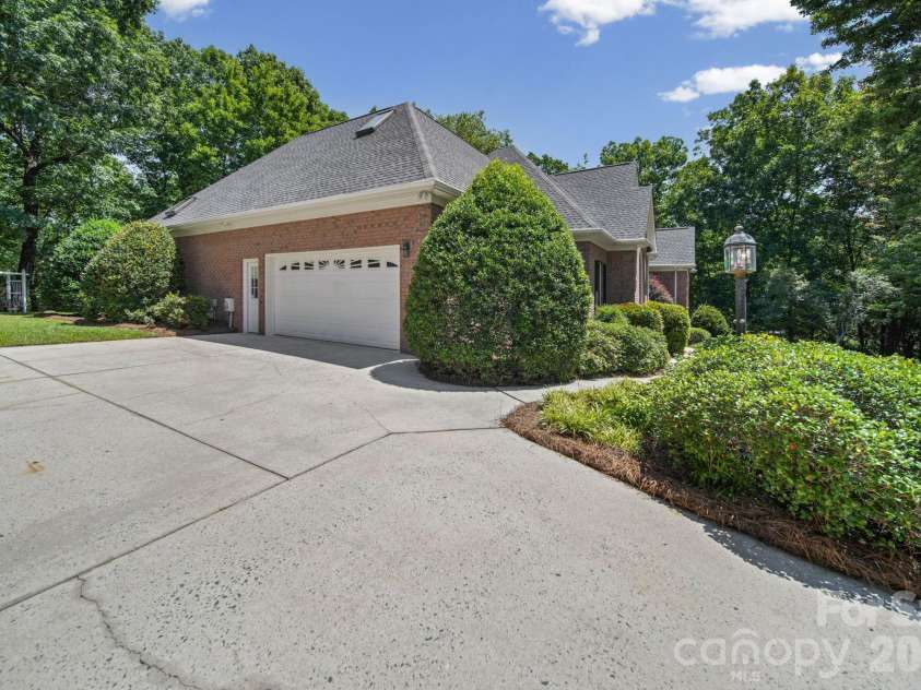 417 Crooked Oak Drive, Oakboro, NC 28129.  MLS# CAR4399226, YatesRealty ID 55048. Driveway / Garage View